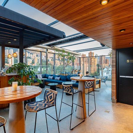 Hotel Marquee Medellin Bagian luar foto The interior of the bar