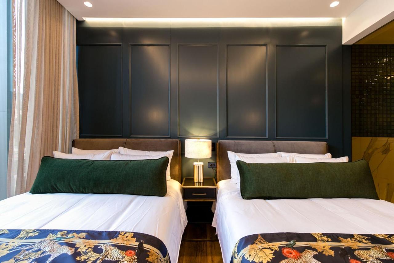 Hotel Marquee Medellin Bagian luar foto Deluxe Room