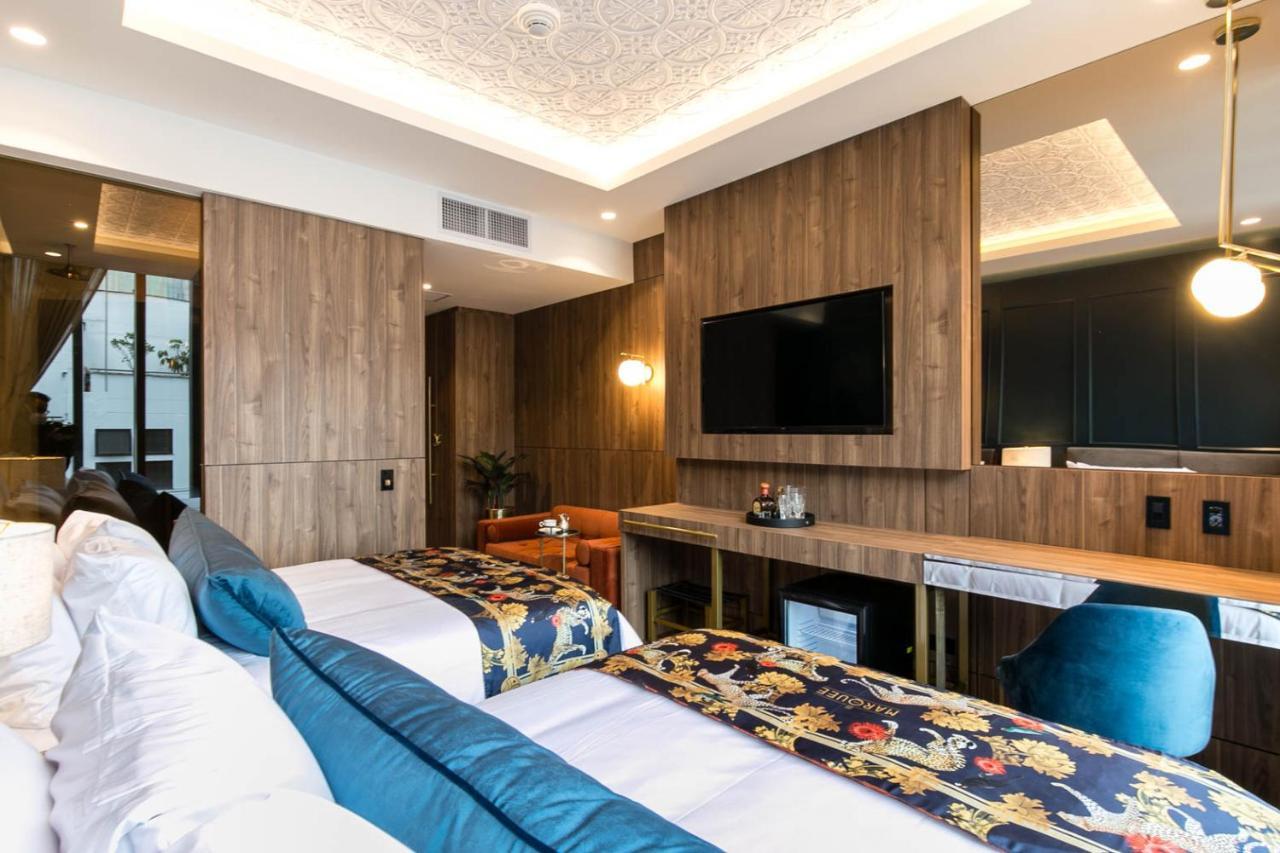 Hotel Marquee Medellin Bagian luar foto A room at the hotel